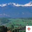 Die Brenta-Dolomiten und die Ortschaft Sarnonico im Nonstal – fotografiert von Ronzone oder Malosco | Autor: Tourismusverband Nonstal und Brenta-Dolomiten